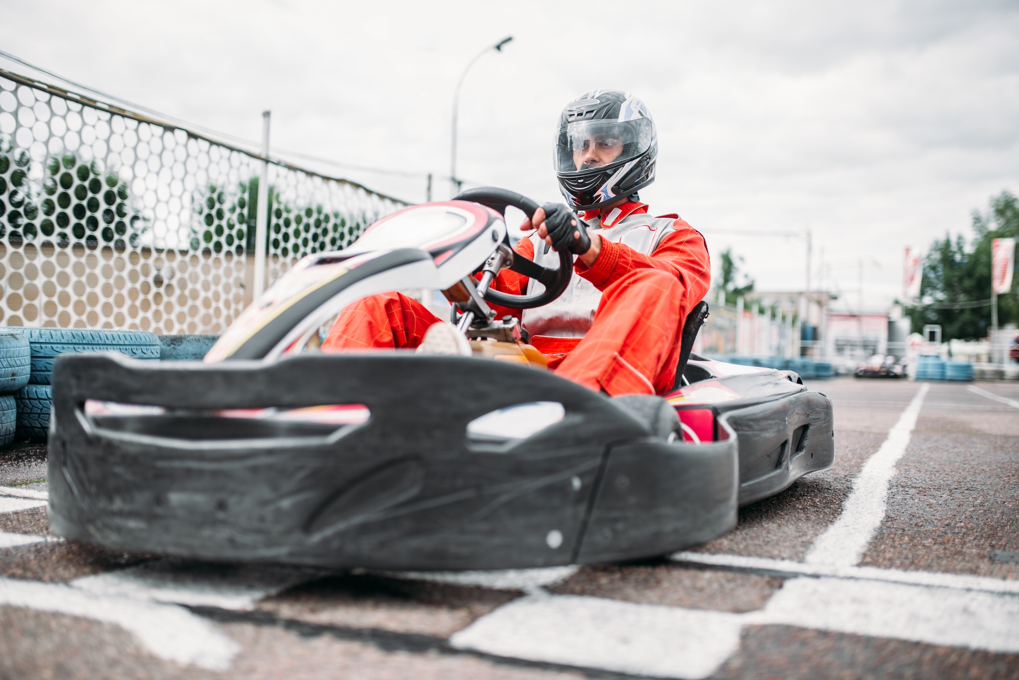 Kart racer on start line, go cart driver